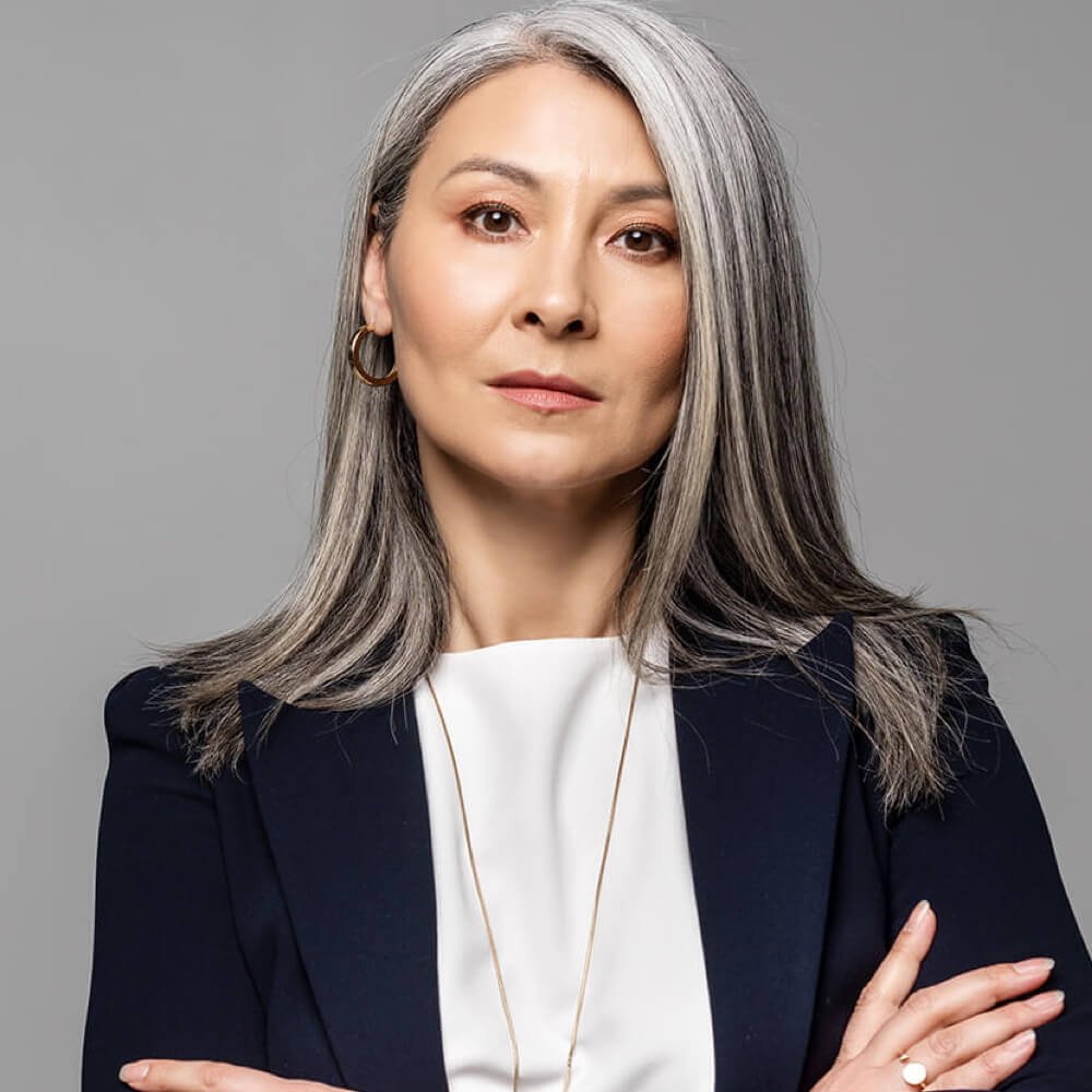 confident asian businesswoman with grey hair and c 2023 11 27 04 55 11 utc 1